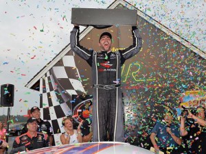 Sergio Pena celebrates after winning Saturday's NASCAR K&N Pro Series East race at Virginia International Raceway. Photo by Getty Images for NASCAR