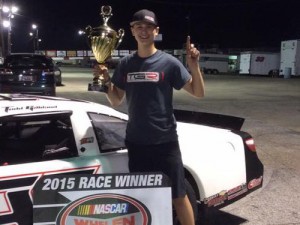 Todd Gilliland took home the winning hardware after the apparent Late Model Stock winner was disqualified, giving Gilliland the feature victory. Photo courtesy GPS Media