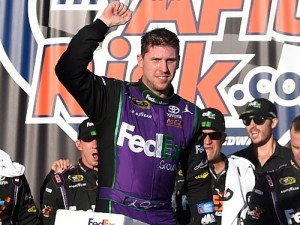 Denny Hamlin celebrates in Victory Lane after winning Sunday's NASCAR Sprint Cup Series race at Chicagoland Speedway.  Photo by Josh Hedges/Getty Images