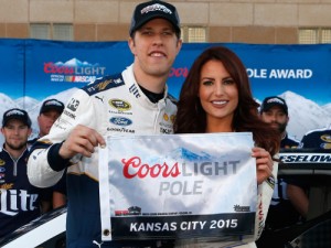 Brad Keselowski poses with the Coors Light Pole award after qualifying for the pole position for Sunday's NASCAR Sprint Cup Series race at Kansas Speedway.  Photo by Brian Lawdermilk/NASCAR via Getty Images