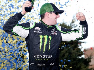 Kyle Busch celebrates in victory lane after winning Saturday's NASCAR Xfinity Series race at Kansas Speedway.  Photo by Matt Sullivan/Getty Images