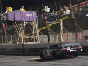 Christopher Bell crosses under the checkered flag to score the Super Late Model win. Photo courtesy CARS Media