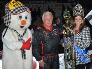 Veteran driver Dave Mader III celebrates in victory lane after winning Friday night's Snowball Derby Super Stocks feature.  Photo by Eddie Richie/Turn One Photos/Loxley, AL