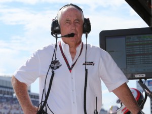 Roger Penske watches the track activity from his team's pit stand during last year's IndyCar race at Pocono Raceway.  Team Penske will enter its 50th year of competition in 2016.  Photo by Chris Jones