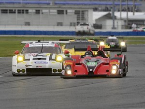 A group of cars make their way through the infield road course at Daytona International Speedway during Saturday's practice session for the upcoming Rolex 24 sports car race for the IMSA WeatherTech SportsCar Championship series. Photo by Richard Dole LAT Photo USA