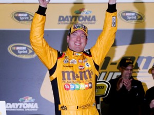 Kyle Busch celebrates in Victory Lane after winning the second NASCAR Sprint Cup Series Can-Am Duel qualifying race Thursday night at Daytona International Speedway. Photo by Brian Lawdermilk/Getty Images