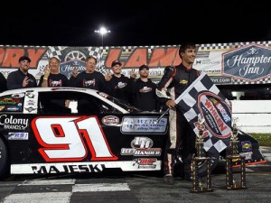 Ty Majeski celebrates with his team after winning the Super Late Model championship at the New Smyrna Speedway World Series of Asphalt Stock Car Racing. Photo courtesy Jason Christley