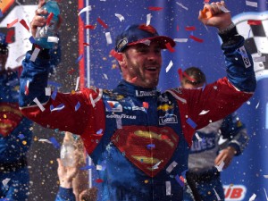 Jimmie Johnson celebrates in victory lane after winning Sunday's NASCAR Sprint Cup Series race at Auto Club Speedway in Fontana, California.  Photo by Jonathan Moore/Getty Images