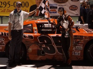 Tasha Kummer celebrates in victory lane after scoring her first Limited Late Model feature win Saturday night at Greenville-Pickens Speedway.  Photo by Mike LaBissoniere