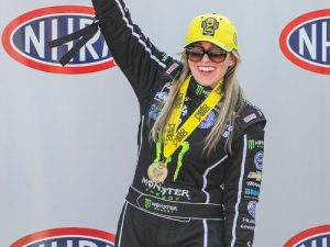 Brittany Force celebrates after winning in the Top Fuel finals in the NHRA Four-Wide Nationals at zMax Dragway. Photo: NHRA Media