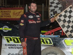 Asphalt ace Bubba Pollard showed off his dirt track skills with a win in Saturday night's Crate Late Model feature at Senoia Raceway.  Photo by Francis Hauke/22fstops.com