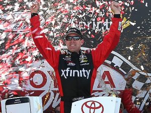 Carl Edwards celebrates in victory lane after winning Sunday's NASCAR Sprint Cup Series race at Richmond International Raceway. Photo by Matt Hazlett/Getty Images