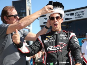 Arie Luyendyk crowns Helio Castroneves as the new Speed King of Phoenix International Raceway after setting the new track record during qualifications for Saturday night's Verizon IndyCar Series race. Photo by Chris Jones