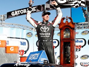 Kyle Busch celebrates in victory lane after winning Saturday's NASCAR Camping World Truck Series race at Martinsville Speedway.  Photo by Matt Hazlett/Getty Images