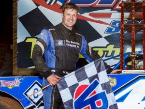 T.J. Reaid celebrates in victory lane at Dixie Speedway after scoring the Super Late Model victory Saturday night.  Photo by Kevin Prater/praterphoto.com