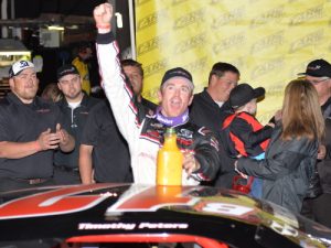 Timothy Peters celebrates in victory land after winning the Late Model Stock portion of Saturday night's Orange Blossom 300 at Orange County Speedway.  Photo by Kyle Tretow / CARS Tour