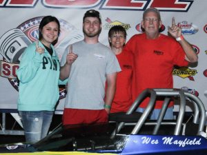 Wesley Mayfield celebrates with family members in the winners circle at Atlanta Dragway after scoring Saturday's Super Pro victory.  Photo: Jerry Towns Photography