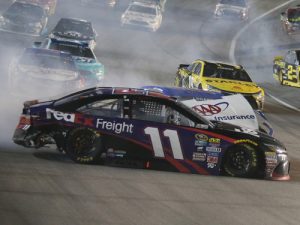 Denny Hamlin (11) and Joey Logano (11) wreck on lap 241 of last week's NASCAR Sprint Cup Series race at Kansas Speedway.  Photo by Jerry Markland/Getty Images