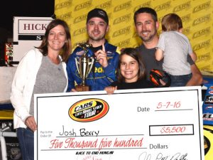 Josh Berry stands in victory lane with JR Motorsports Vice President Kelley Earnhardt Miller and her family after Berry's CARS Racing Tour Late Model Stock win at Hickory Motor Speedway. Photo by Kyle Tretow/CARS Tour