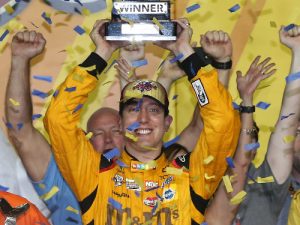 Kyle Busch celebrates after winning Saturday night's NASCAR Sprint Cup Series race at Kansas Speedway.  Photo by Sean Gardner/NASCAR via Getty Images