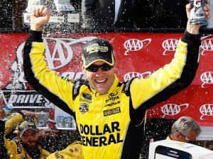 Matt Kenseth celebrates in victory lane after winning Sunday's NASCAR Sprint Cup Series race at Dover International Speedway.  Photo by Jeff Zelevansky/NASCAR via Getty Images