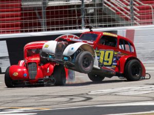 Tony Armbruster (19) tangles with Robert Cheney (1) as the two take the white flag while racing for second in Saturday's Legends Masters division race at Atlanta Motor Speedway. Bill Plemons, Jr. would take the win. Photo by Tom Francisco/Speedpics.net 