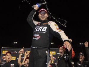 Bobby Santos celebrates in Victory Lane at Thompson Speedway Motorsports Park following his NASCAR Whelen Modified Tour win Wednesday night. Photo by Michael Ivins/NASCAR via Getty Images