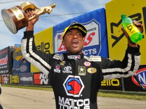 Antron Brown celebrates after scoring the Top Fuel victory in Sunday's NHRA Mello Yello Drag Racing Series event at Route 66 Raceway.  Photo: NHRA Media