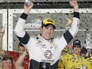 Brad Keselowski celebrates in victory lane after winning Saturday night's NASCAR Sprint Cup Series race at Daytona International Speedway.  Photo by Sean Gardner/NASCAR via Getty Images