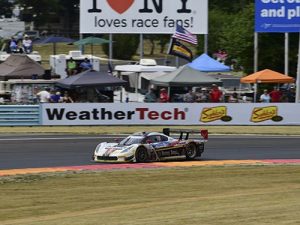 Action Express Racing drivers Christian Fittipaldi and Joao Barbosa put their Corvette Daytona Prototype into victory lane in Sunday's Sahlen's Six Hours of the Glen for the IMSA WeatherTech SportsCar Championship Series at Watkins Glen International.  Photo by Richard Dole LAT Photo USA