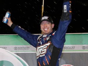 Kyle Busch celebrates in victory lane after winning Friday night's NASCAR Xfinity Series race at Kentucky Speedway.  Photo by Jerry Markland/Getty Images