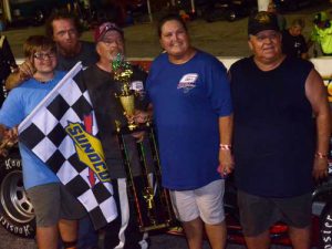 Okie Mason celebrates in victory lane after winning Friday night's Modifieds of Mayhem feature at 5 Flags Speedway.  Photo by Eddie Richie/Turn One Photos/Loxley, AL