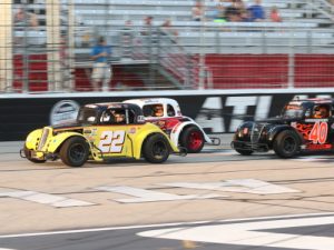 Scott Moseley (22) battles with Bill Plemons, Jr. (15) and Tina Johnson (40) during the Masters feature at last week's Thursday Thunder at Atlanta Motor Speedway.  Photo by Tom Francisco/Speedpics.net