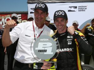 Simon Pagenaud (right) and team President Tim Cindric celebrate Team Penske's 500th overall pole position Saturday at Iowa Speedway. Photo by Chris Jones