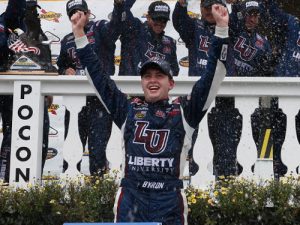 William Byron celebrates in Victory Lane after winning Saturday's NASCAR Camping World Truck Series race at Pocono Raceway.  Photo by Brian Lawdermilk/Getty Images