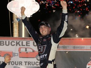 William Byron celebrates in victory lane after winning Thursday night's NASCAR Camping World Truck Series race at Kentucky Speedway.  Photo by Jerry Markland/Getty Images