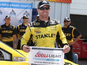 Carl Edwards poses with the Coors Light Pole Award after qualifying on the pole position for Sunday's NASCAR Sprint Cup Series race at Watkins Glen International.  Photo by Matt Sullivan/Getty Images