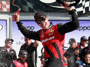 Joey Logano celebrates in victory lane after winning Saturday's NASCAR Xfinity Series race at Watkins Glen International.  Photo by Matt Sullivan/Getty Images