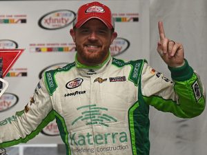 Justin Marks celebrates after scoring his first career NASCAR Xfinity Series race Saturday afternoon in the rain at Mid-Ohio Sports Car Course.  Photo: Jonathan Moore/Getty Images