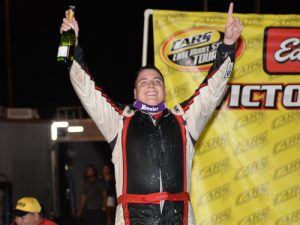 Stephen Nasse celebrates after scoring the CARS Racing Tour Super Late Model feature Saturday night at Orange County Speedway.  Photo by Kyle Tretow/CARS Tour