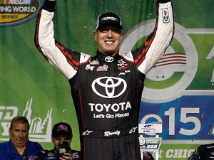 Kyle Busch celebrates in victory lane after winning Friday night's NASCAR Camping World Truck Series race at Chicagoland Speedway.  Photo by Jeff Zelevansky/NASCAR via Getty Images