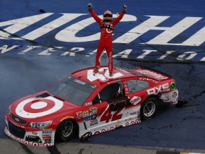 Kyle Larson celebrates after winning Saturday's NASCAR Sprint Cup Series race at Michigan International Speedway.  Photo by Jeff Zelevansky/NASCAR via Getty Images