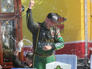 Johnny Sauter celebrates in victory lane after winning Saturday's NASCAR Camping World Truck Series race at Martinsville Speedway.  Photo by Jerry Markland/Getty Images