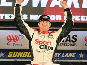 Carl Edwards celebrates in victory lane at Texas Motor Speedway after winning Sunday night's rain-shortened NASCAR Sprint Cup Series race. Photo by Jerry Markland/Getty Images