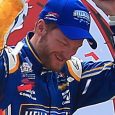 After a massive late-race wreck scrambled the running order in Saturday’s ToyotaCare 250, Dale Earnhardt, Jr. survived a two-lap dash in overtime to win his first NASCAR Xfinity Series race […]